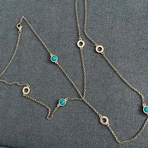 Long necklace with blue gems